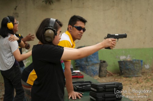 Ela firing an Armscor Armscor 1911 A2 â€“ 22 TCM. 