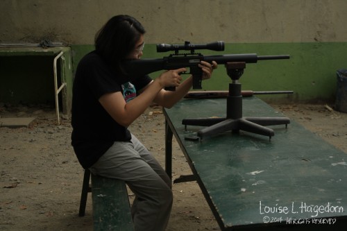 Ela's turn with the MAK 22. The rain stopped so we were able to shoot at the nearer table.