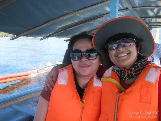 Liza and Mars using the cool life jackets from Taal Lake Yacht Club